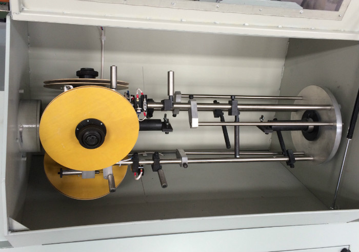 卧式双头履带牵引包纸机